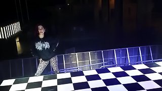 Ravishing punk cougar Joanna Angel strips on a stage