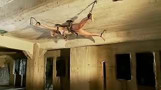 Blonde girl hangs on the ceiling and gets toyed