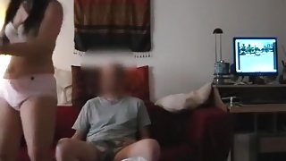 Asian girl has oral and missionary sex with her white bf on the sofa