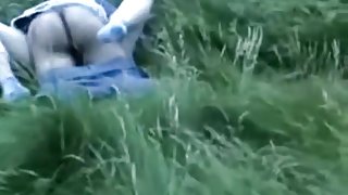 Voyeur tapes a couple having missionary and cowgirl sex in nature