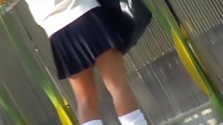 Unsuspecting Asian girl viciously skirt sharked in public.