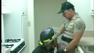 Hot fireman and a sexy gay cop blow each other